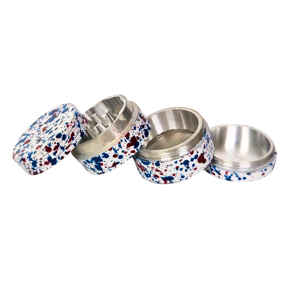 Set of four metallic Grinder with a multicolored speckled pattern on a white background